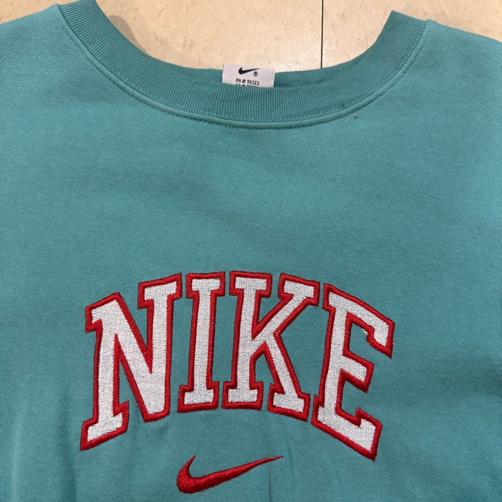Men’s Nike Teal Crewneck with Red Nike Logo Size Large But Fits Like A Medium